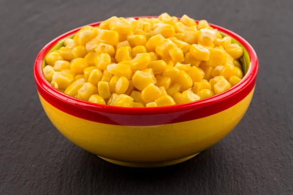 Sweet canned corn in bowl — Stock Photo, Image