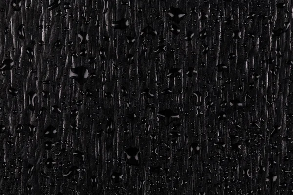 黑石头上的水滴 — 图库照片