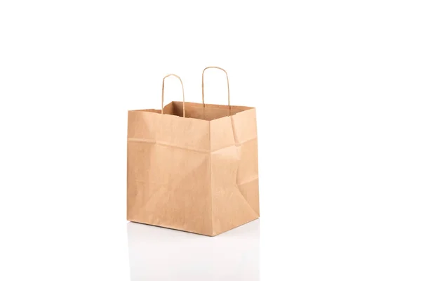 Paper shopping bag on white — Stock Photo, Image