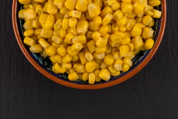 Sweet canned corn in bowl — Stock Photo, Image