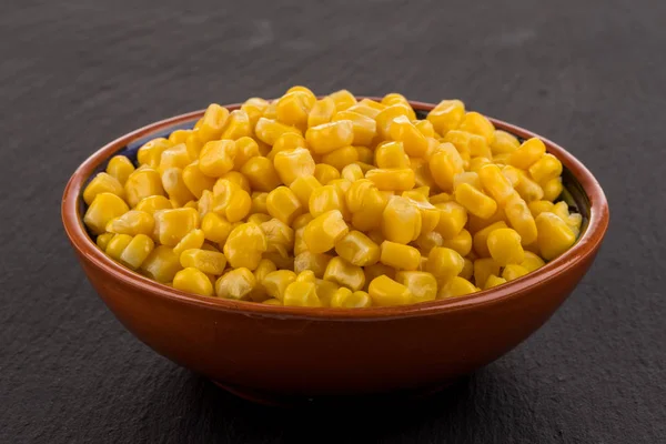 Sweet canned corn in bowl — Stock Photo, Image