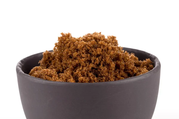 Brown sugar on white — Stock Photo, Image