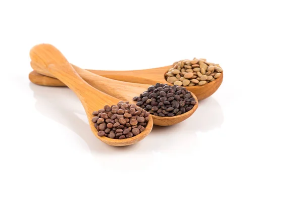 Lentils in spoon isolated — Stock Photo, Image