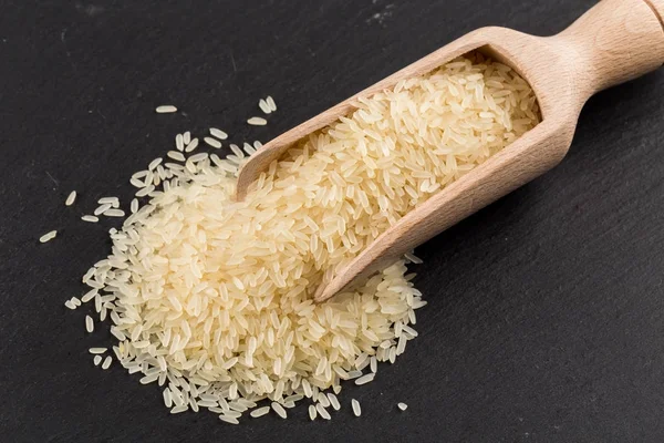 Rice in scoop — Stock Photo, Image