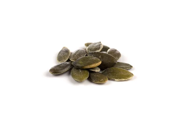 Pumpkin seeds on a white background — Stock Photo, Image