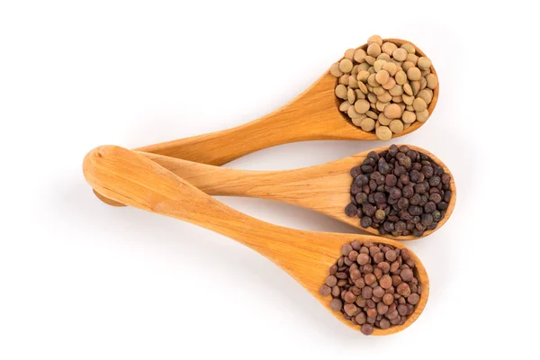 Lentils in spoon isolated — Stock Photo, Image