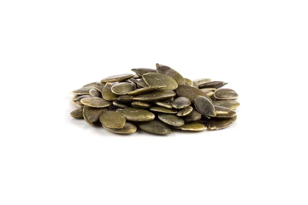 Pumpkin seeds on a white background — Stock Photo, Image