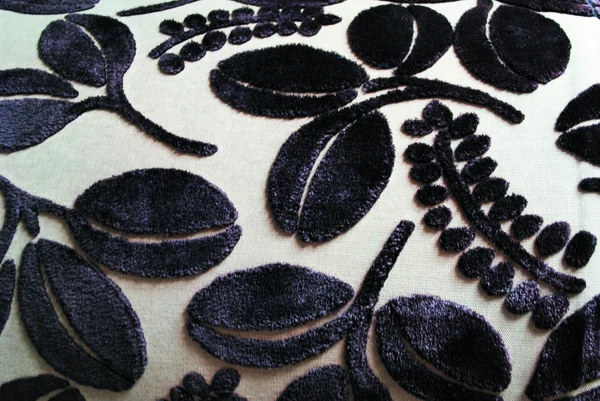 bej kumaş dokusu ve bitki resmi.