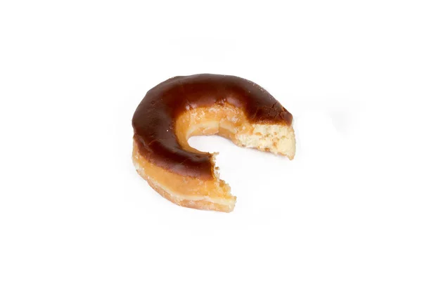 Gebissene leckere Donut mit Schokolade — Stockfoto