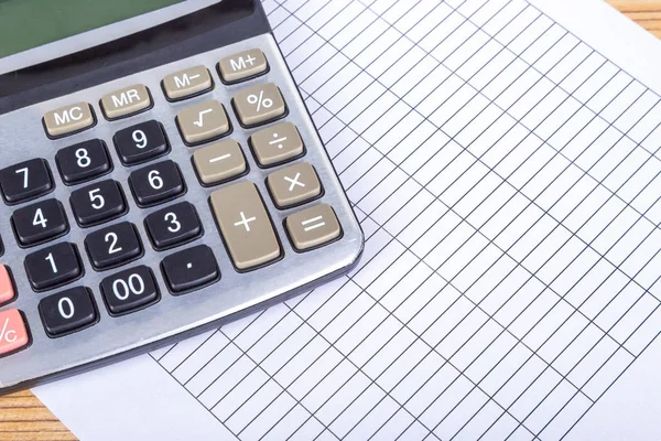 Calculator on Blank Report Paper — Stock Photo, Image