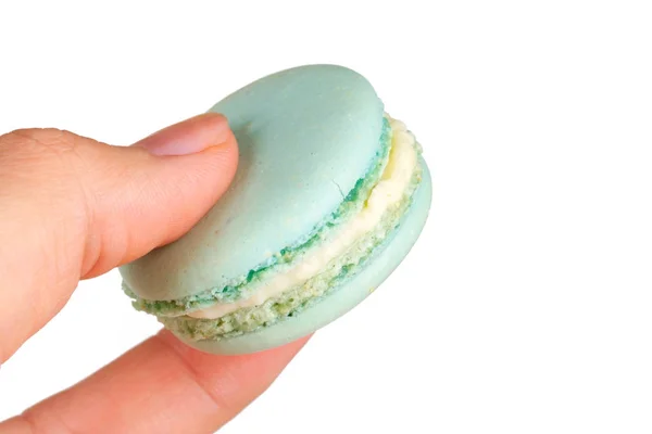 Handen håller Macaron — Stockfoto