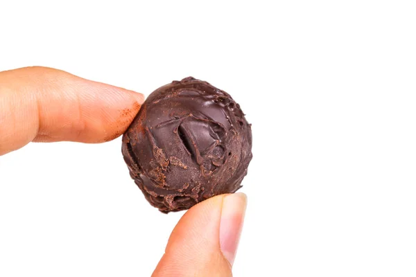 Melkachtig chocolade bal op de Hand — Stockfoto