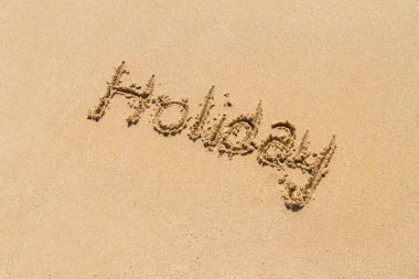 Word tatil kum üzerinde