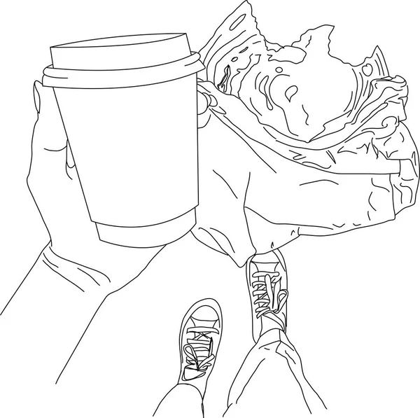 Tek kullanımlık bir fincan kahve tutan el 