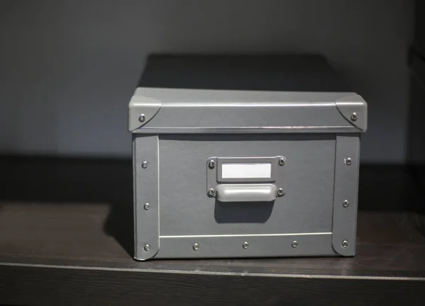 Gray suitcase on the shelf — Stock Photo, Image