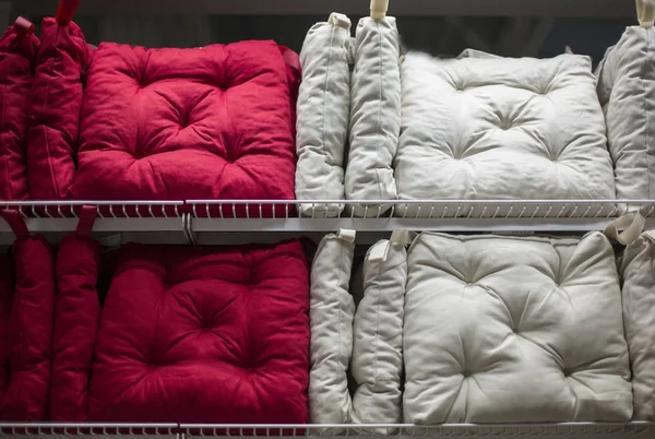 Colorful pillows in the shop window — Stock Photo, Image