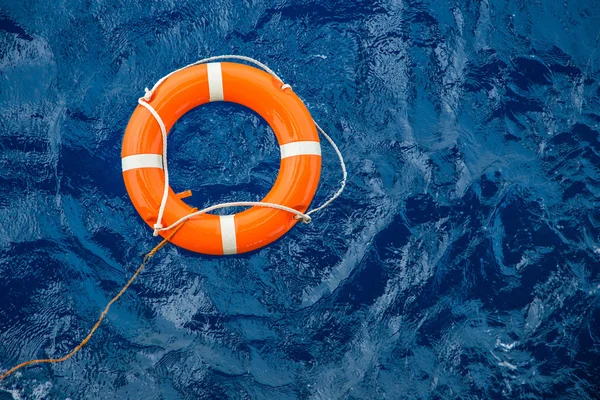 Safety equipment, Life buoy or rescue buoy floating on sea to rescue people from drowning man