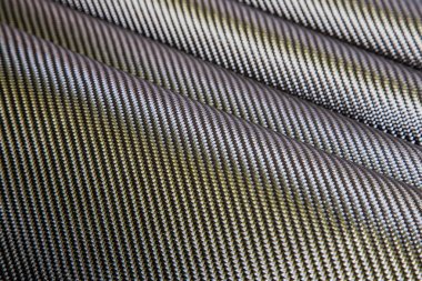Araba parçalarını güçlendirmek için siyah dokuma karbon fiber kompozit doku.