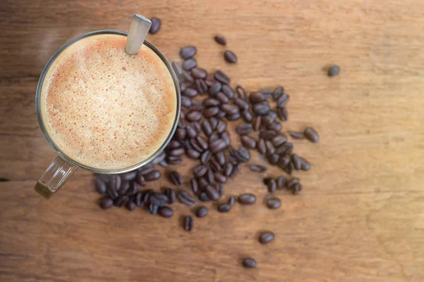 Fincan Espresso kahve ve kahve fasulye arka plan