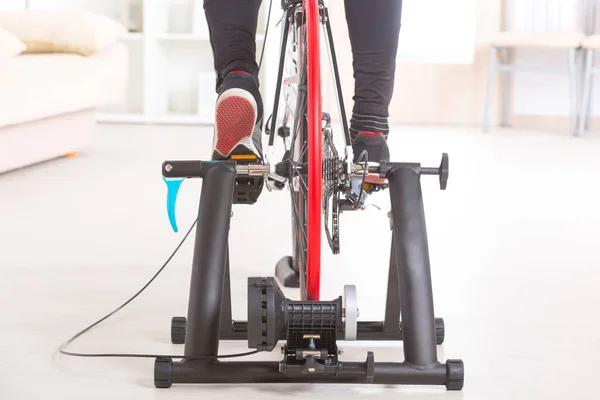 Man on bicycle trainer — Stock Photo, Image