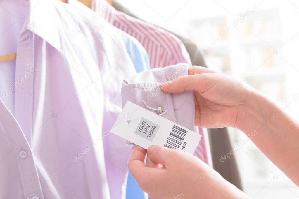 Woman's hands with a barcode label