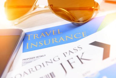 Boarding pass tickets and travel insurance clipart