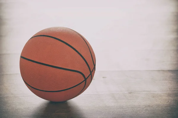 Basketball on wooden floor