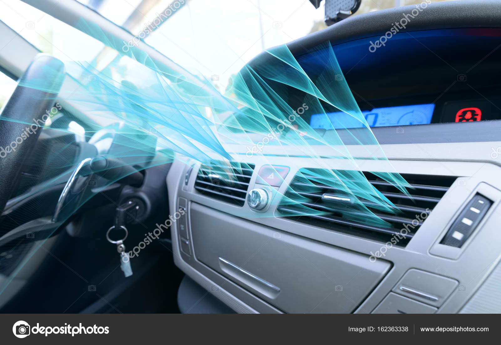 Driver hand tuning air ventilation grille Stock Photo by ©Amaviael