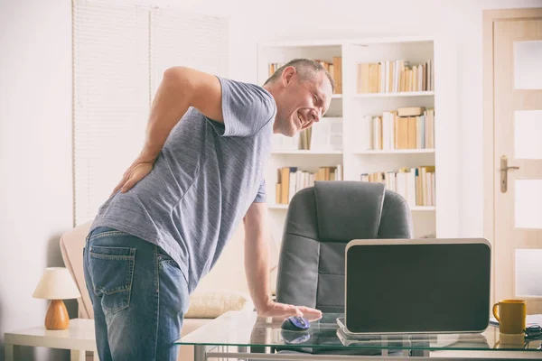 Man suffering from low back pain — Stock Photo, Image