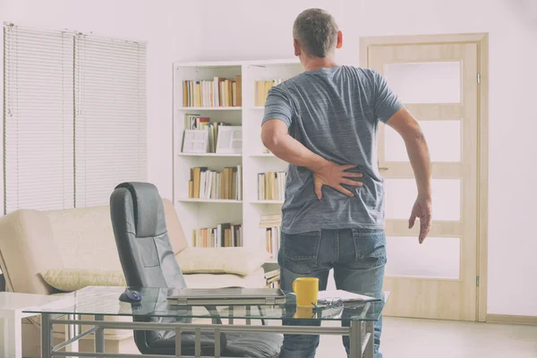 Man suffering from low back pain — Stock Photo, Image