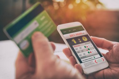 Adam akıllı telefon ile spor bahisleri
