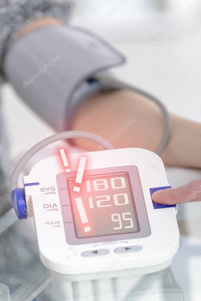 Doctor measuring blood pressure 