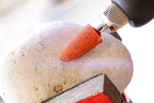 Sanding rock with rotary multi tool