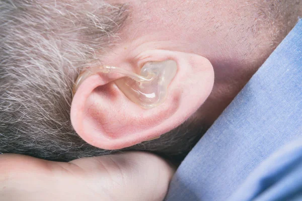 Close-up on the hearing aid — Stock Photo, Image