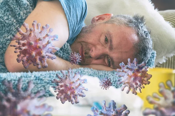ウイルス性疾患を患っている男は悲しいことに彼のベッドの毛布で覆われている コロナウイルス感染の概念 — ストック写真
