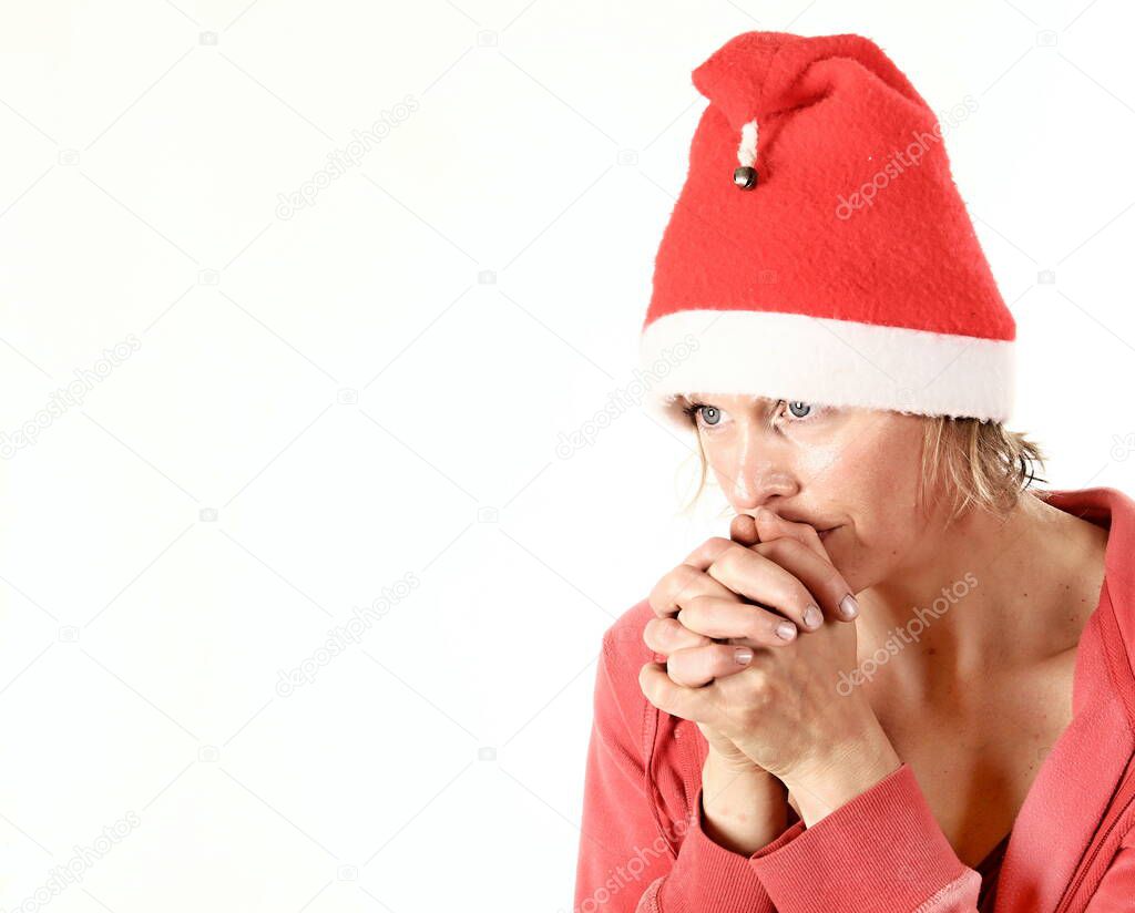 woman praying with hands together on white background