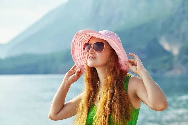 Young relaxing woman in a hat — Stock Photo, Image