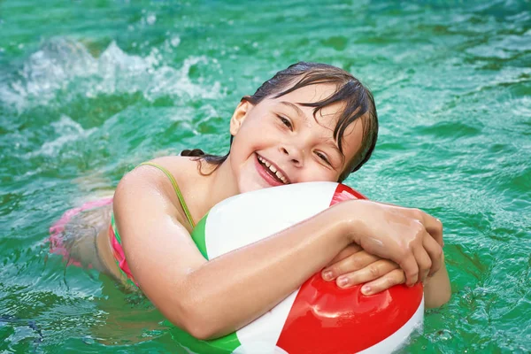 Funny little girl in water — Stock Photo, Image
