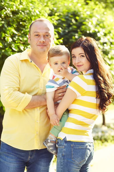 Outdoor portrait of a happy family — Stock Photo, Image