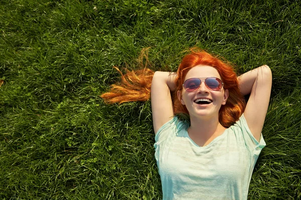 Relaxing redhead girl — Stock Photo, Image