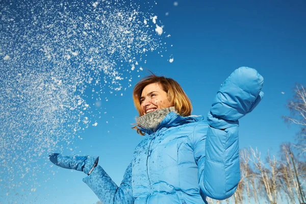 Happy woman on a walk in the winter. girl outdoors enjoying snow. — Stock Photo, Image