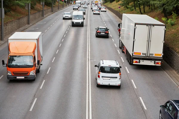 Motorway out of city. going cars on the road. Stock Picture