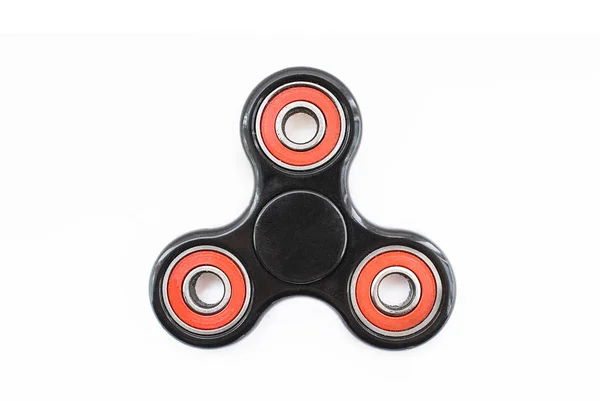 Spinner stres giderici oyuncak siyah ve beyaz zemin üzerine kırmızı kıpır