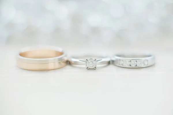 Wedding wedding rings on a light background, selective focus, macro