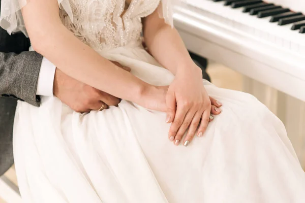 Groom and brides hands with rings, closeup view Royalty Free Stock Photos