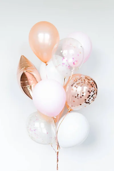 Bunch of balls in white and pink colors on a light background — ストック写真