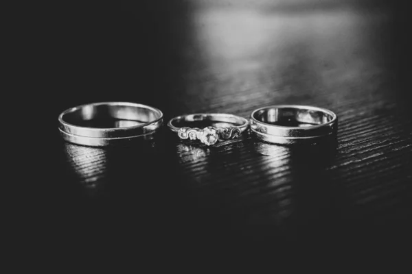 Wedding engagement rings. Love concept.Selective focus. Black an Royalty Free Stock Photos