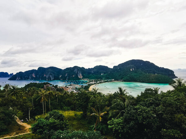 The Man Relaxing on  Phi Phi Don  Twin Bay Viewpoint, Krabi, Thailand