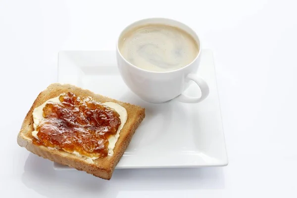 Porzellanteller Mit Einer Tasse Kaffee Und Toast Mit Marillenmarmelade — Stockfoto