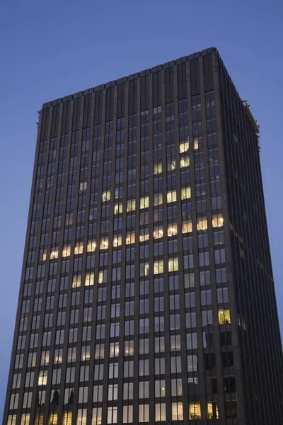 Modern office building at dawn with the lights turned on, Old Montreal, Quebec, Canada, North America